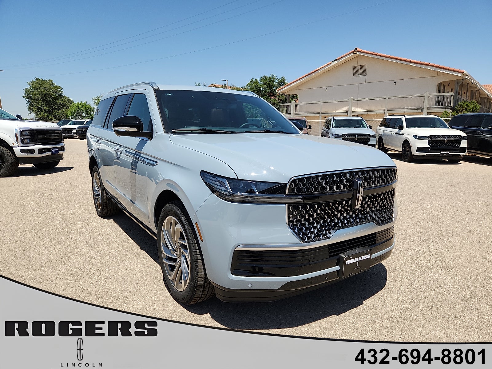 2026 Lincoln Navigator Reserve in Gray Mist Metallic Tri-Coat — front three-quarter view