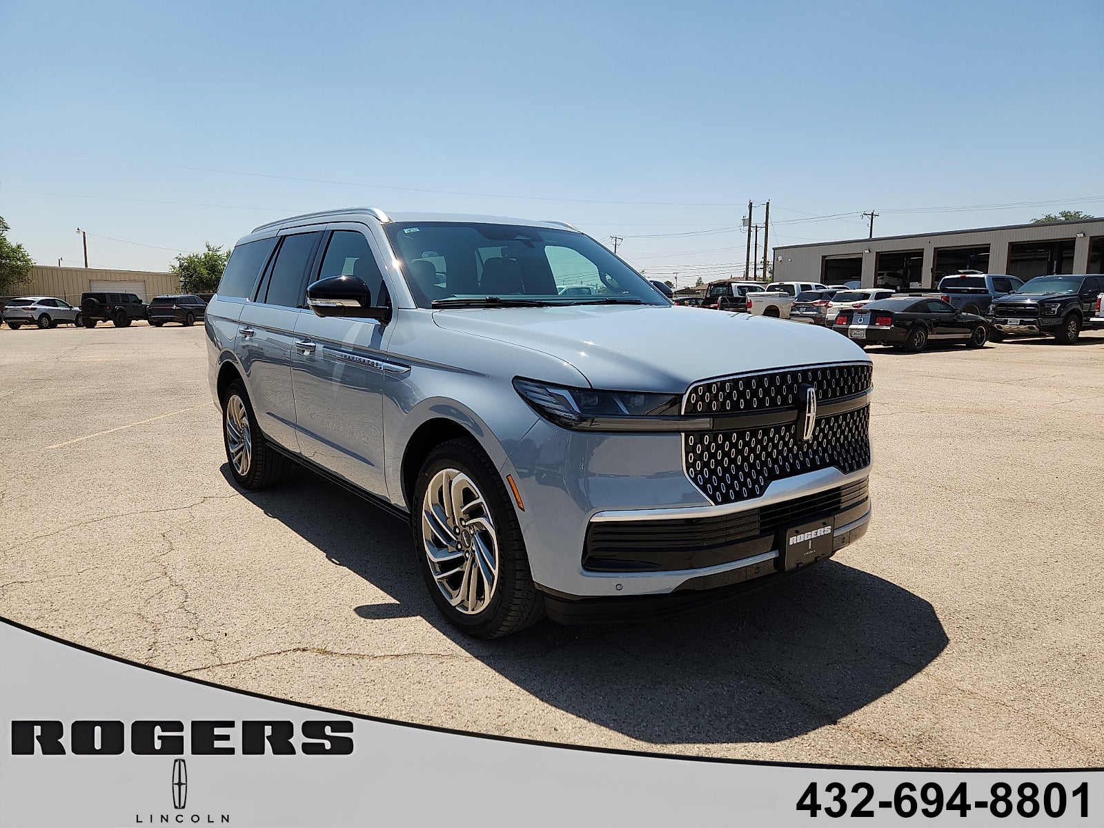 2026 Lincoln Navigator Reserve in Gray Mist Metallic Tri-Coat — front three-quarter view