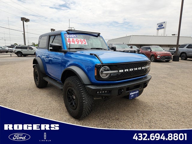 2021 Ford Bronco Wildtrak in Blue Metallic — front three-quarter view