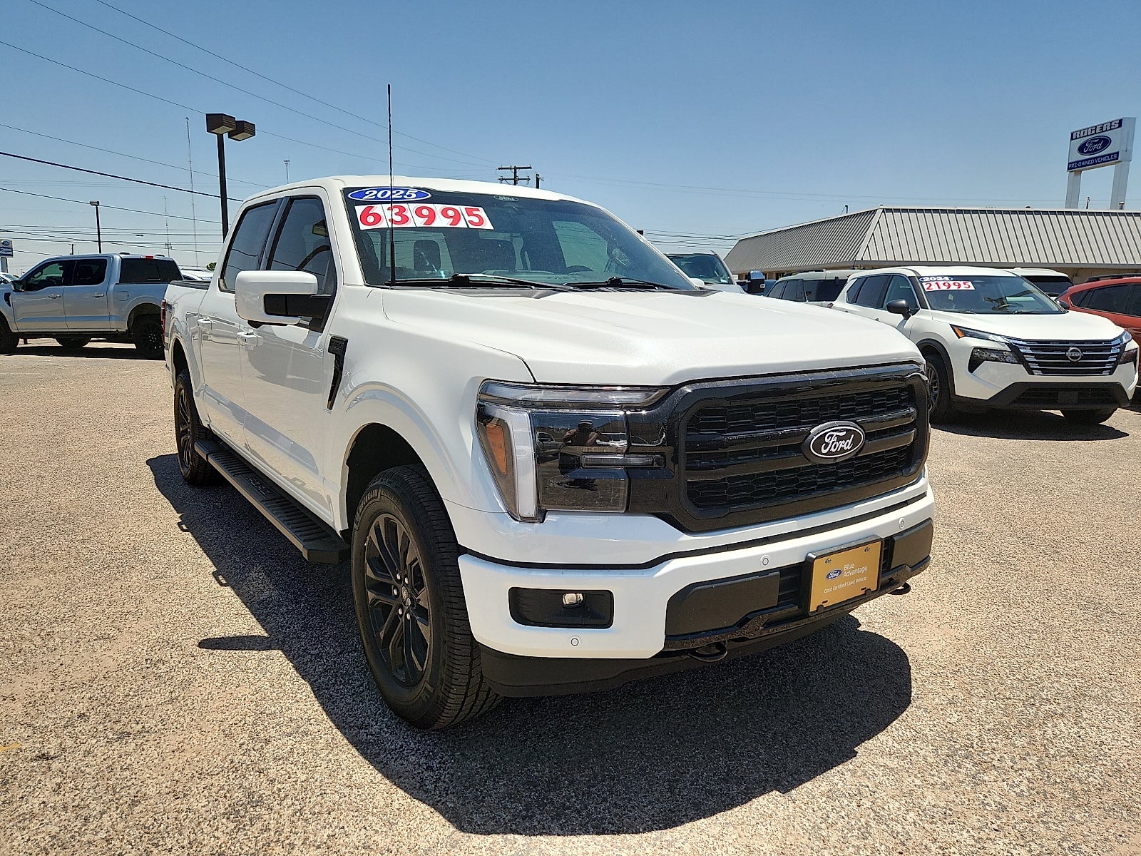 2025 Ford F-150 LARIAT in Star White Metallic Tri-Coat — front three-quarter view