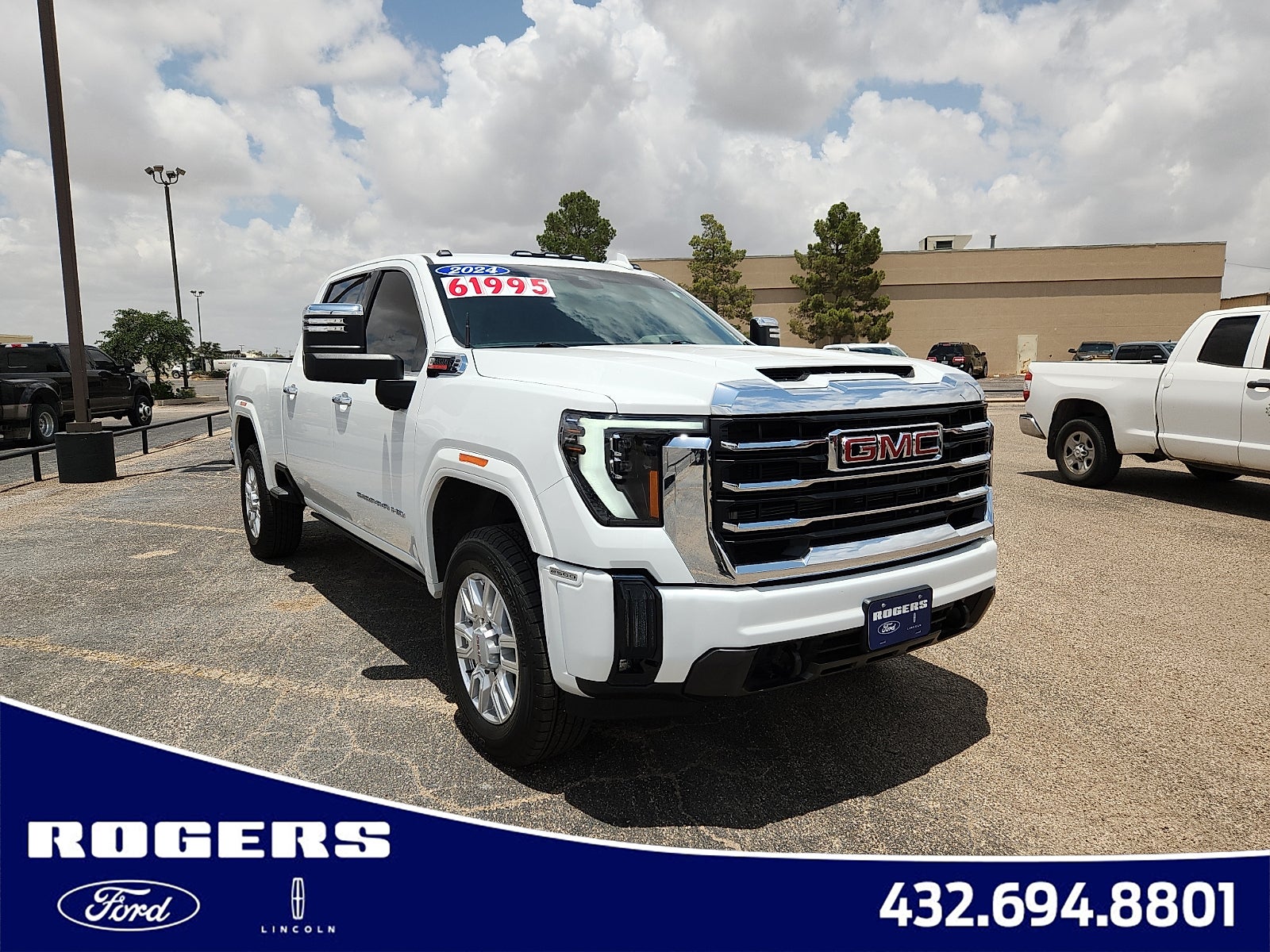 2024 GMC Sierra 2500HD SLT in Summit White — front three-quarter view