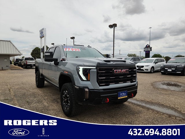 2024 GMC Sierra 2500HD AT4X in Thunderstorm Gray — front three-quarter view